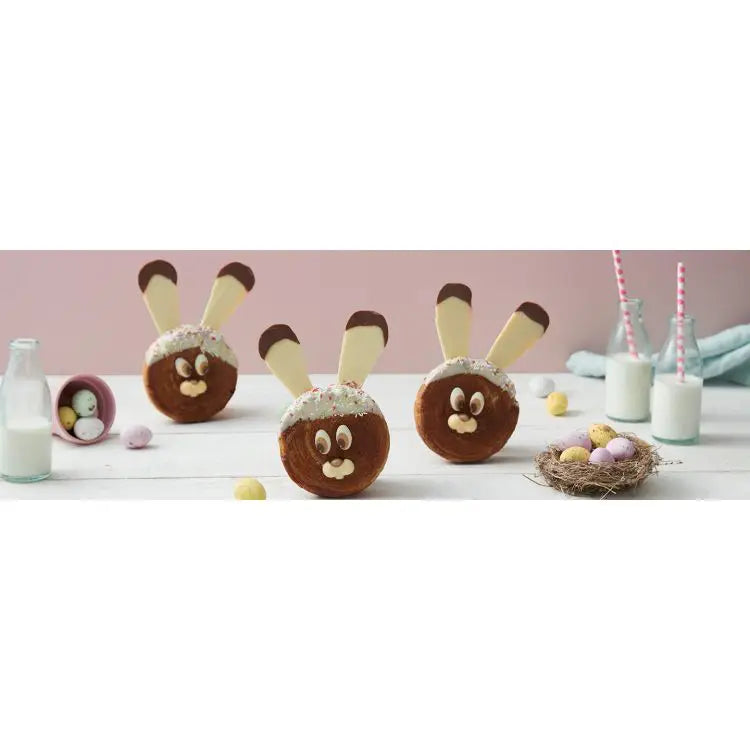 Easter roll made from pain au raisin with white chocolate and rabbit-themed decoration