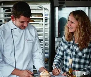 Bakery workspace with staff preparing products for Delifrance Singapore Wholesale