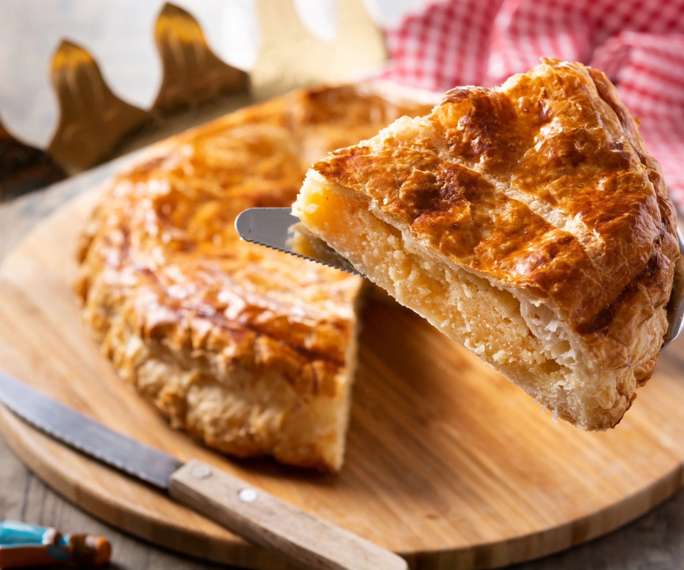 Close-up of galette des rois puff pastry layers demonstrating premium lamination quality